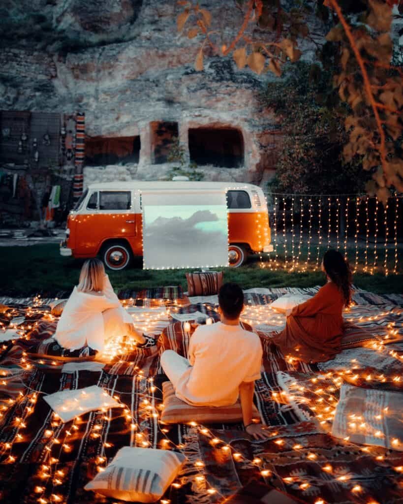 night time van camping with twinkle lights