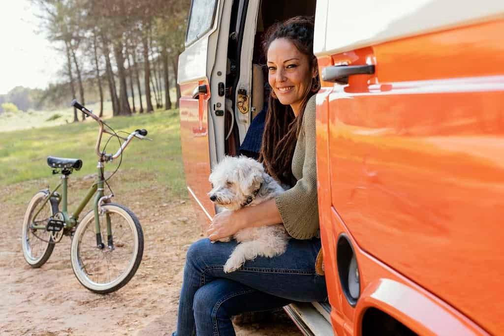 portrait-woman-car-with-dog